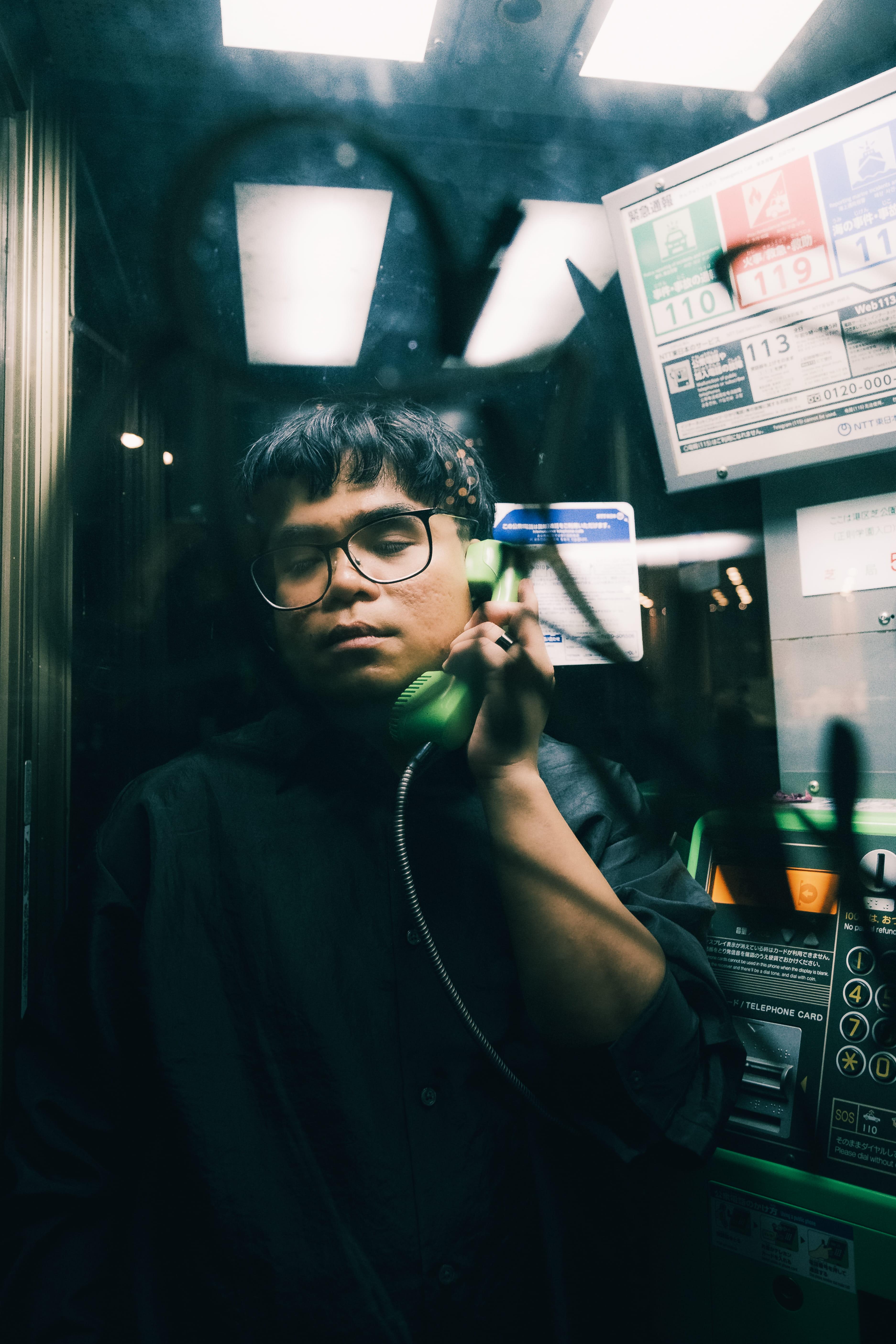 Al Jang in a Tokyo phone booth